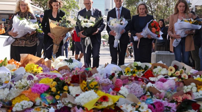 dirigeants et responsables politiques déposant des bouquets de fleurs en hommage aux victimes après une attaque meurtrière en milieu urbain