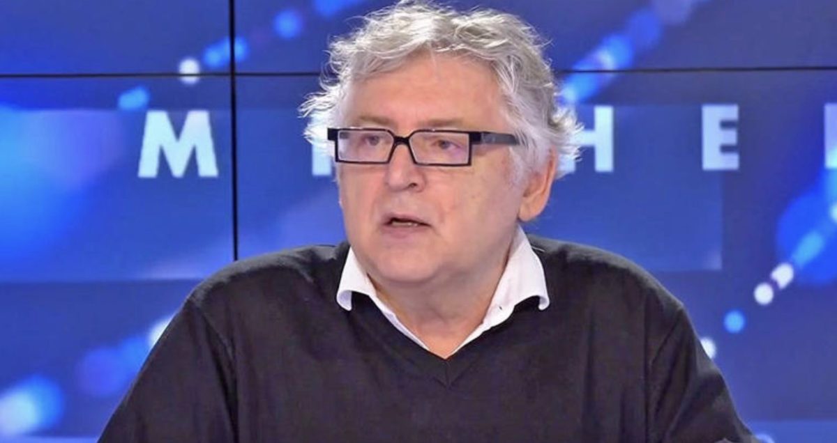 Michel Onfray s’exprime lors d’une émission télévisée sur CNews, assis sur un plateau de télévision face aux caméras. Le philosophe et essayiste français intervient dans un débat consacré à l’islam, à l’islamisme et aux grands sujets de société. Son analyse critique des positions d’Éric Zemmour sur la distinction entre islam et islamisme a suscité de nombreuses réactions dans le débat public français.